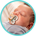 Newborn with soother
