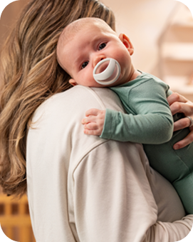 Baby with NUK soother