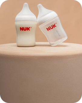Baby feeding with NUK bottle